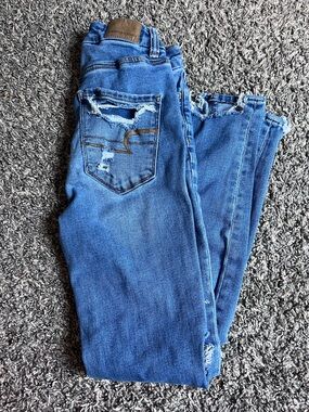American Eagle Outfitters Blue Distressed High-Rise Women's Jeans